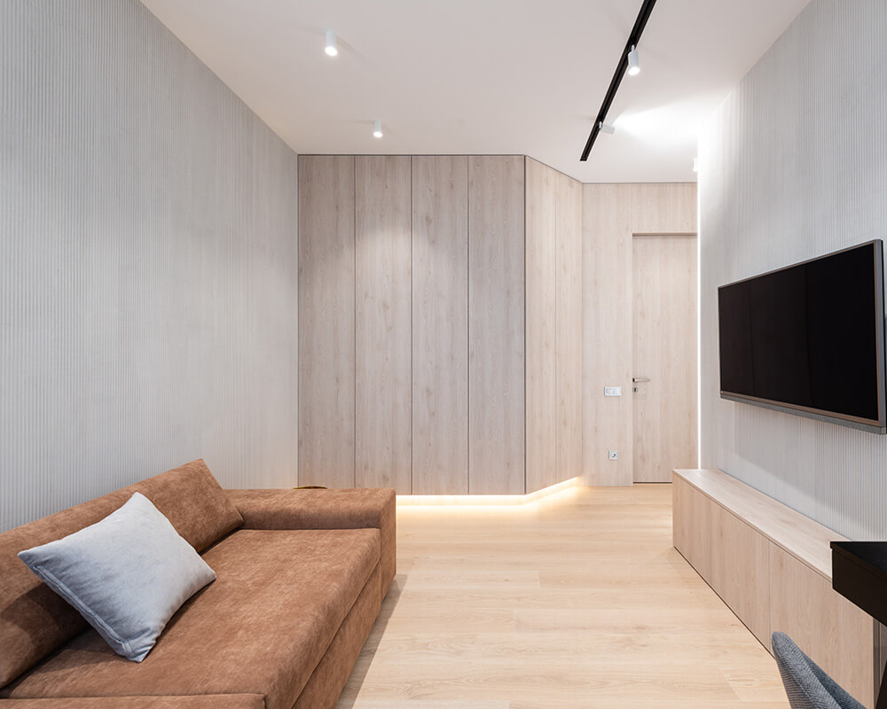 barna színű modern kanapéágy minimalista stílusú nappaliban
